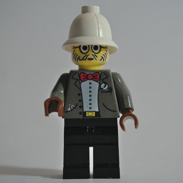 Dr. Kilroy in Dark Gray Suit