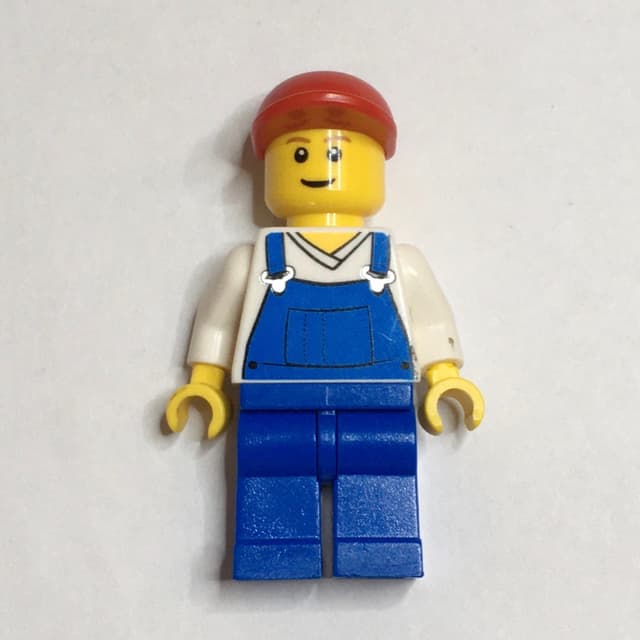 Man, Blue Overalls over White V-Neck Shirt, Red Cap, Brown Eyebrows