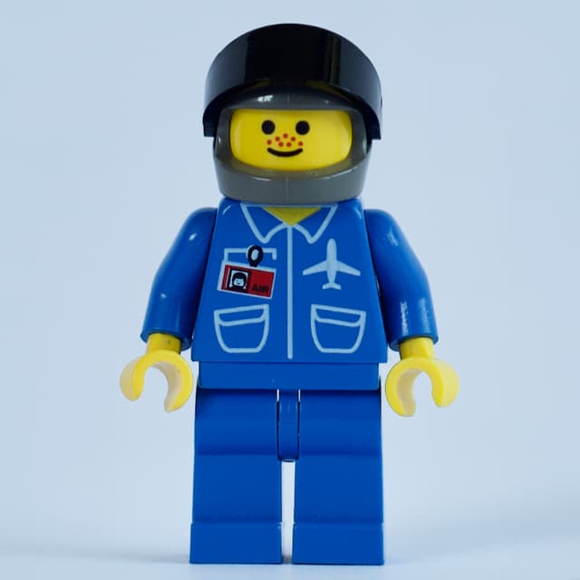 Pilot, Blue Jacket with Plane Logo and ID Badge, Dark Gray Helmet with Visor